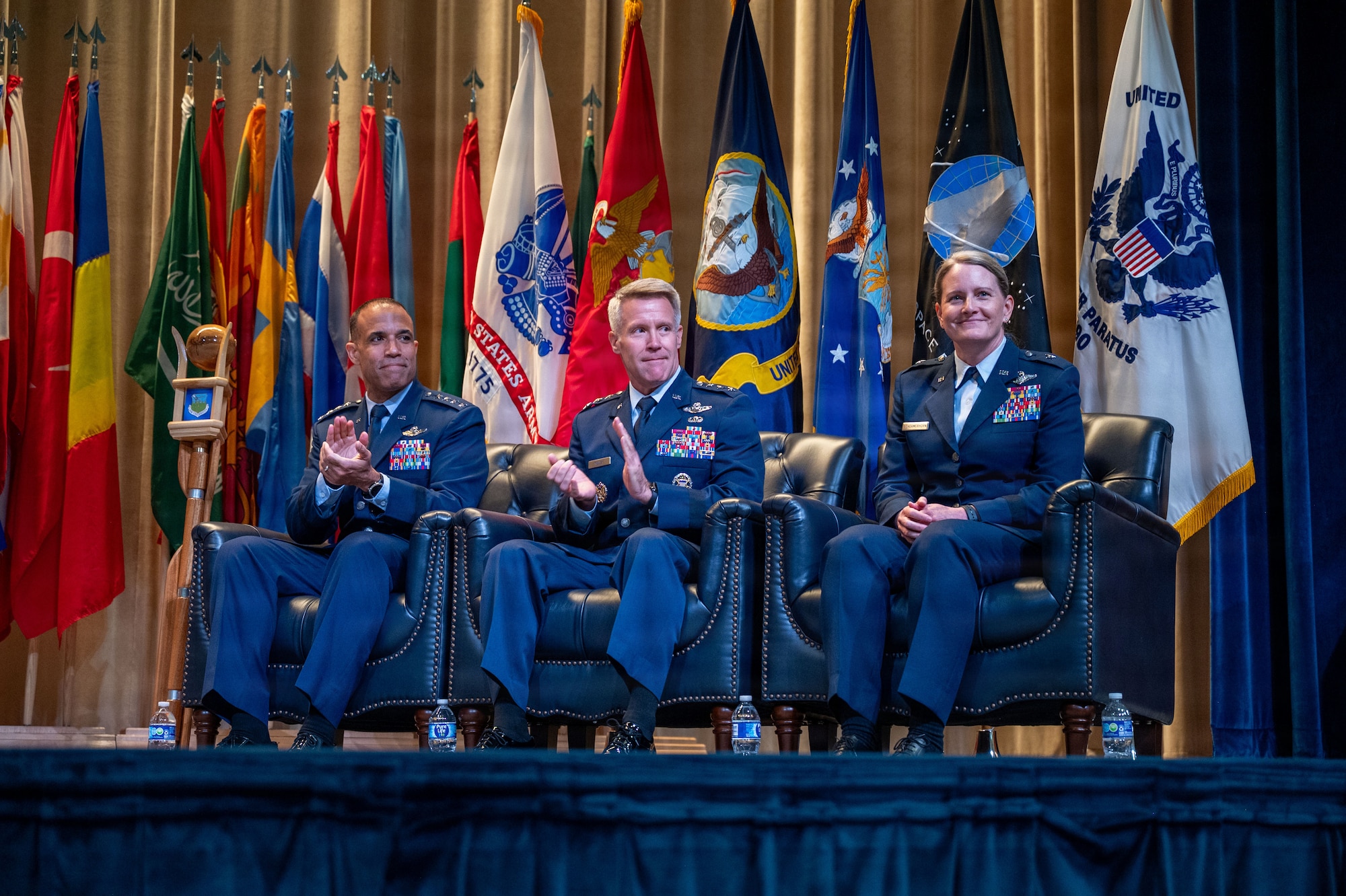 Students from Air War College present a memento from the academic class of 2026 to Brig. Gen. Jocelyn Schermerhorn, AWC commander, during the graduation ceremony for Air War College at Maxwell Air Force Base, Alabama, May 14, 2026. The graduating class consisted of officers from all military branches of the U.S. military, civilian employees of federal government agencies, and officers from international allies and partner nations. (U.S. Air Force photos by Senior Airman Tanner Doerr)