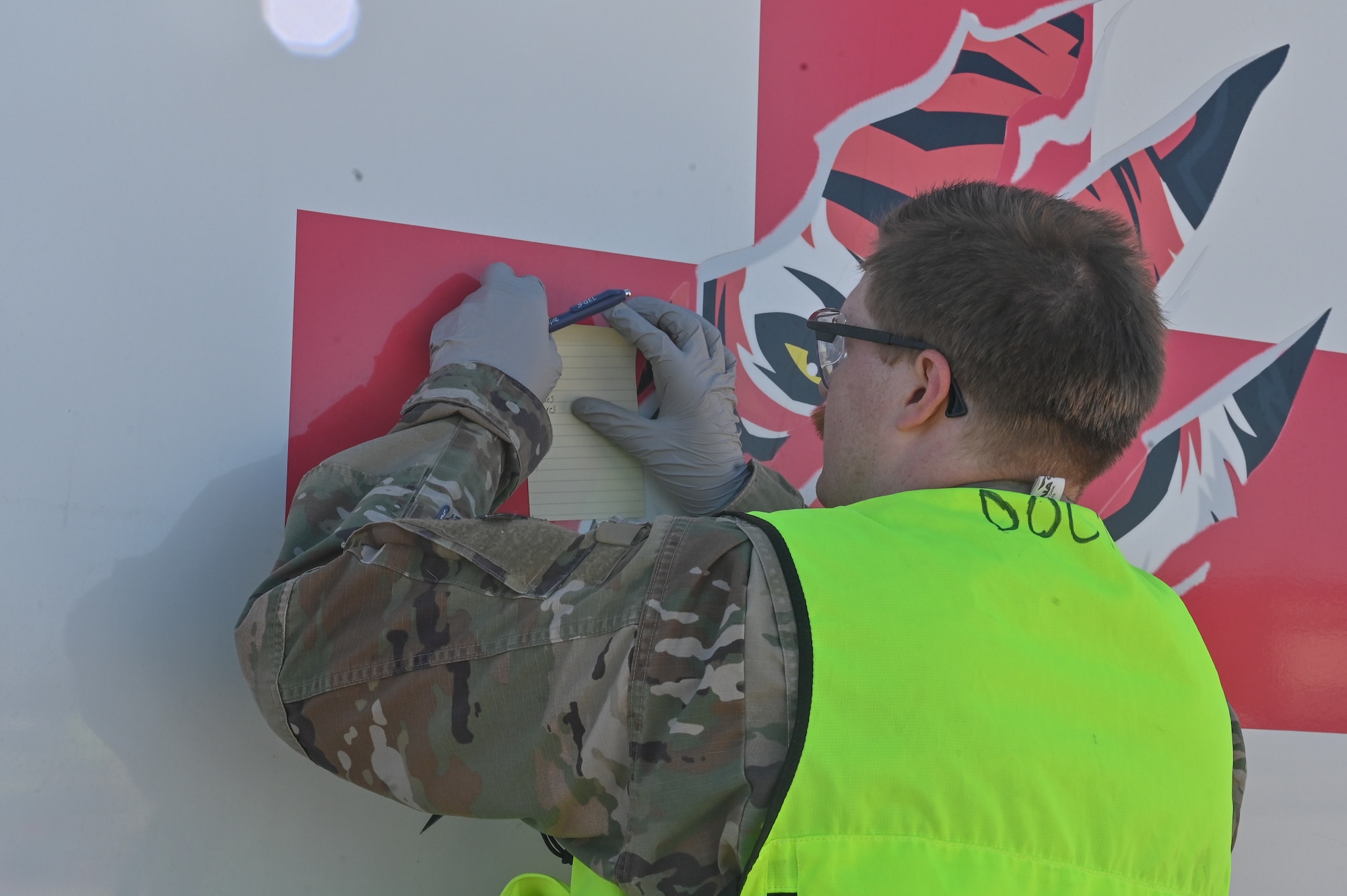 Senior Airman Robert Brantley, 377th Medical Group aerospace medical service specialist, logs the names of patients as part of a Sustainment Operations for Air Force Medical Service Response (SOAR) aircraft mishap full-scale exercise at Kirtland Air Force Base.