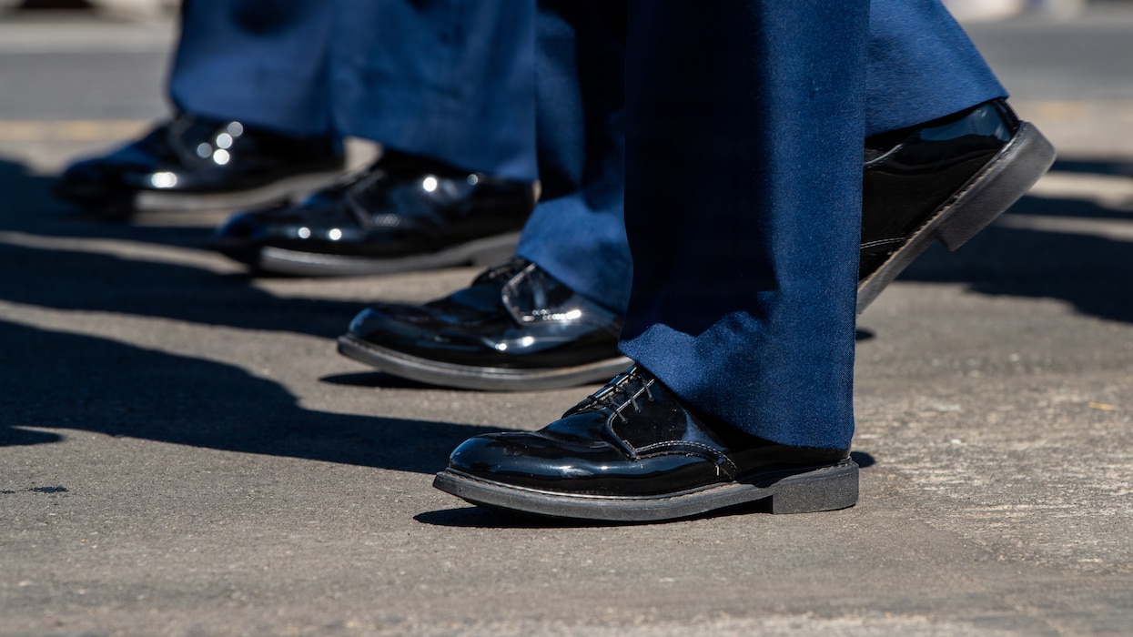 Close-up of the feet of Airmen marching in formation in parade