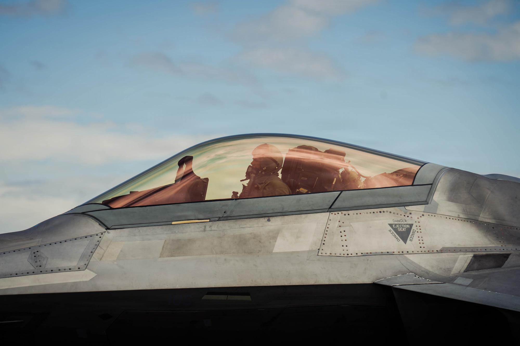 U.S. Air Force Col. Charles Schuck, 3rd Wing commander, taxies an F-22 Raptor aircraft after his final flight on Joint Base Elmendorf-Richardson, Alaska, May 26, 2026. The fini-flight is an Air Force tradition celebrating a pilot's career and achievements prior to a permanent change of station or retirement. (U.S. Air Force photo by Airman 1st Class Keola Vischi)
