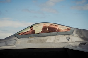 U.S. Air Force Col. Charles Schuck, 3rd Wing commander, taxies an F-22 Raptor aircraft after his final flight on Joint Base Elmendorf-Richardson, Alaska, May 26, 2026. The fini-flight is an Air Force tradition celebrating a pilot's career and achievements prior to a permanent change of station or retirement. (U.S. Air Force photo by Airman 1st Class Keola Vischi)