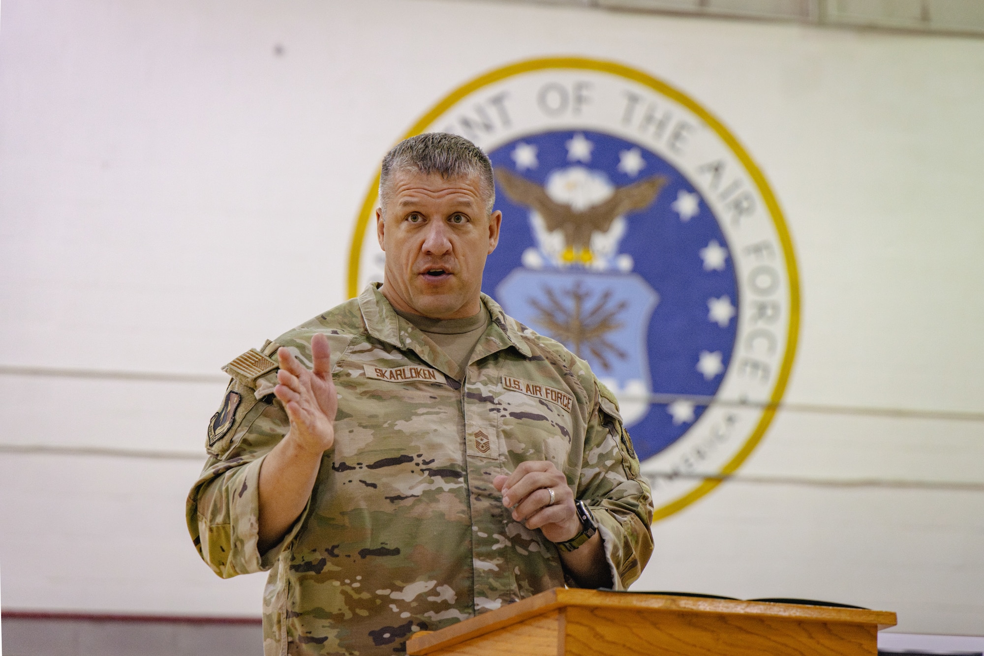 Chief Master Sgt. Joshua Skarloken, 412th Test Wing command chief master sergeant, provides his remarks during the Police Week 2026 opening ceremony on Edwards Air Force Base, California, May 11, 2026. (Air Force photo by Brandon Hernandez)