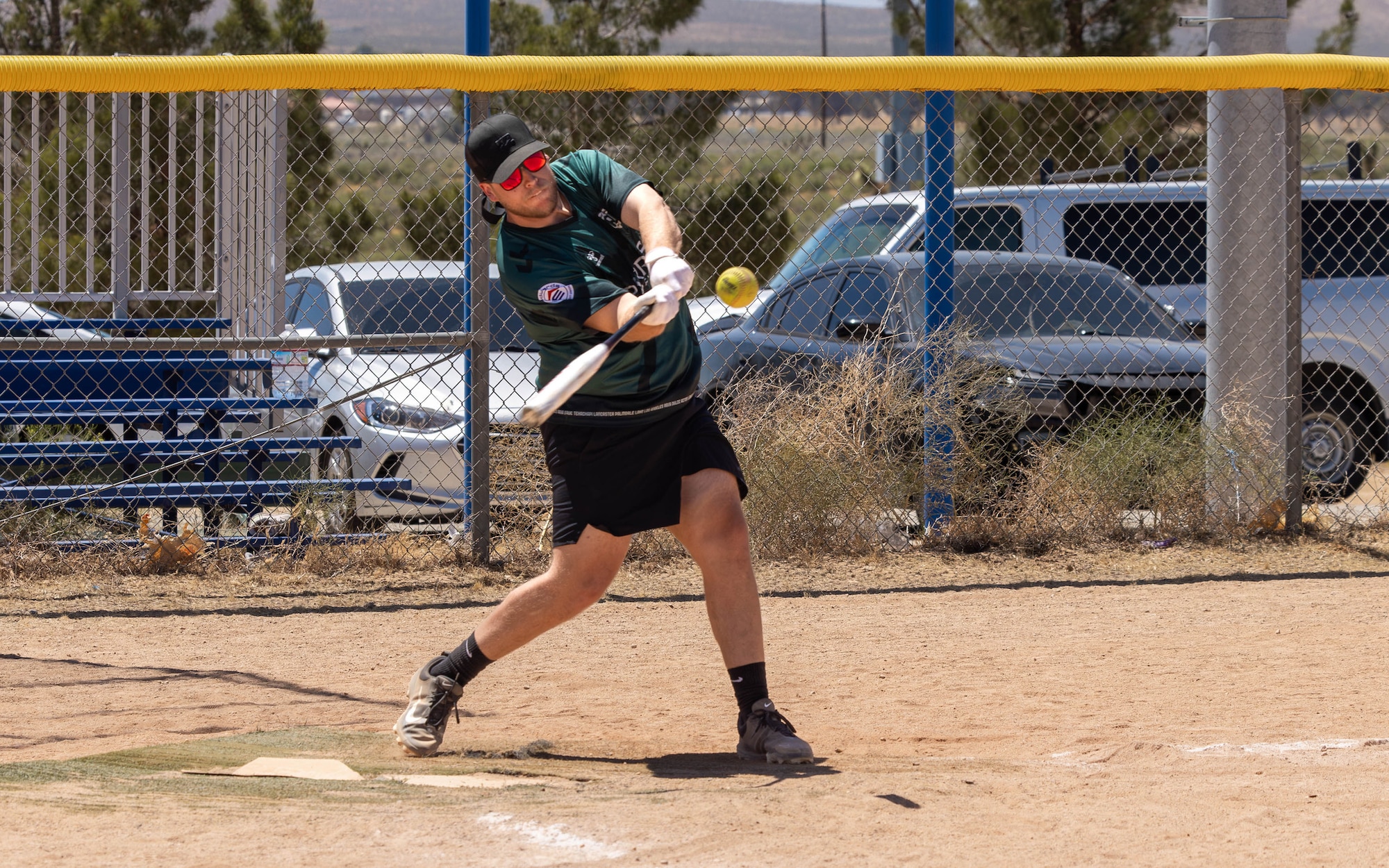 Staff Sgt. Bryce Souders, 412th Security Forces, Detachment 1, Air Force Operating Location Plant 42, gets a hit during the Police Week 2026 Softball Tournament at Edwards Air Force Base, California, May 13, 2026. (Air Force photo by Lindsey Gordon)