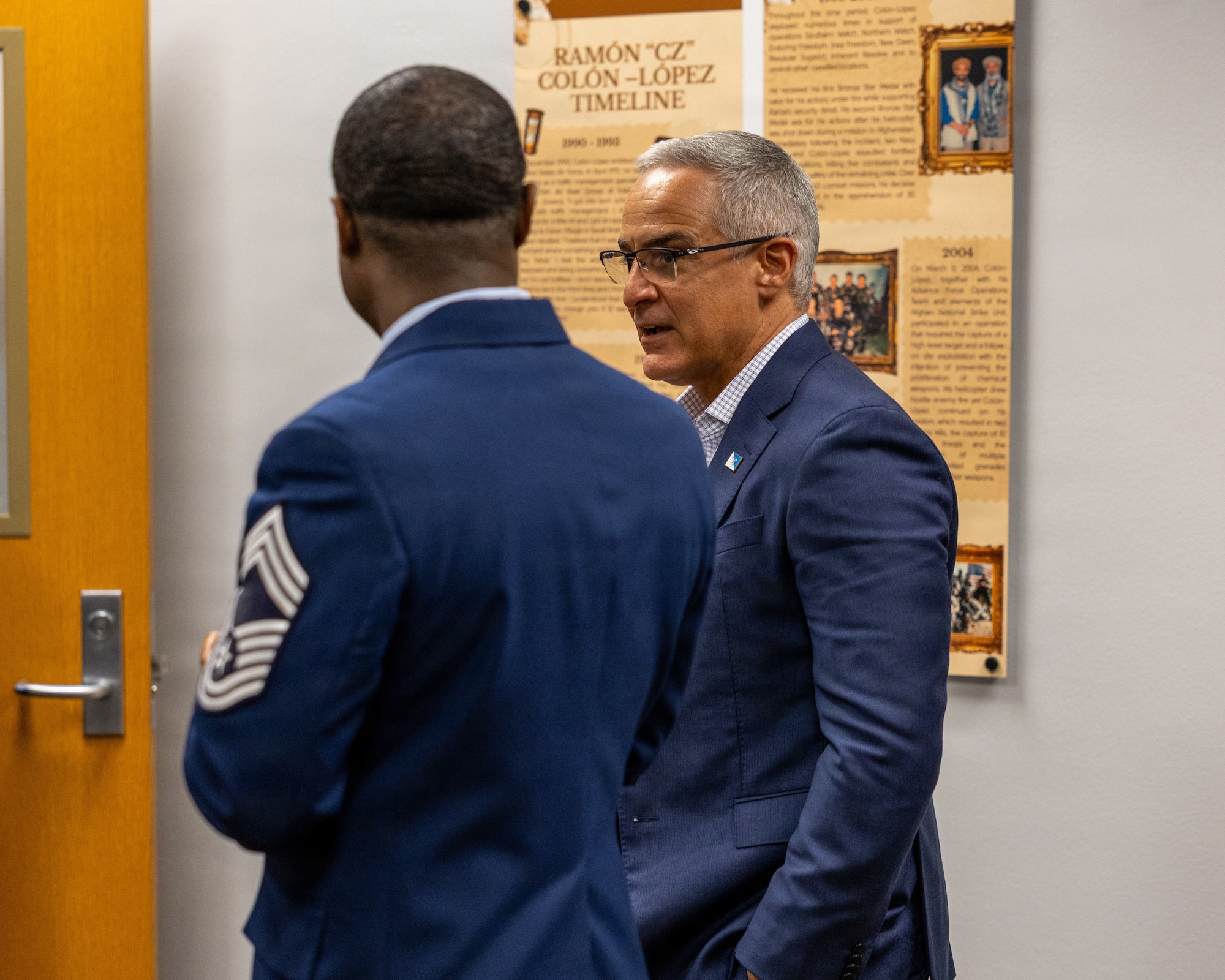 Retired Senior Enlisted Advisor to the Chairman Ramón “CZ” Colón‑López is guided through the newly installed displays honoring his career by U.S. Air Force Chief Master Sgt. Wilfred Morgan, Sheppard Noncommissioned Officer Academy commandant, during a visit to Sheppard Air Force Base, Texas, May 27, 2026.