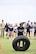 Kristeyan McNair, 15, a sophomore at Shoemaker High School in Killeen, Texas, flips a tire during the Basic Training Challenge at the U.S. Army Experience March 25, 2026, at Fort Hood, Texas.