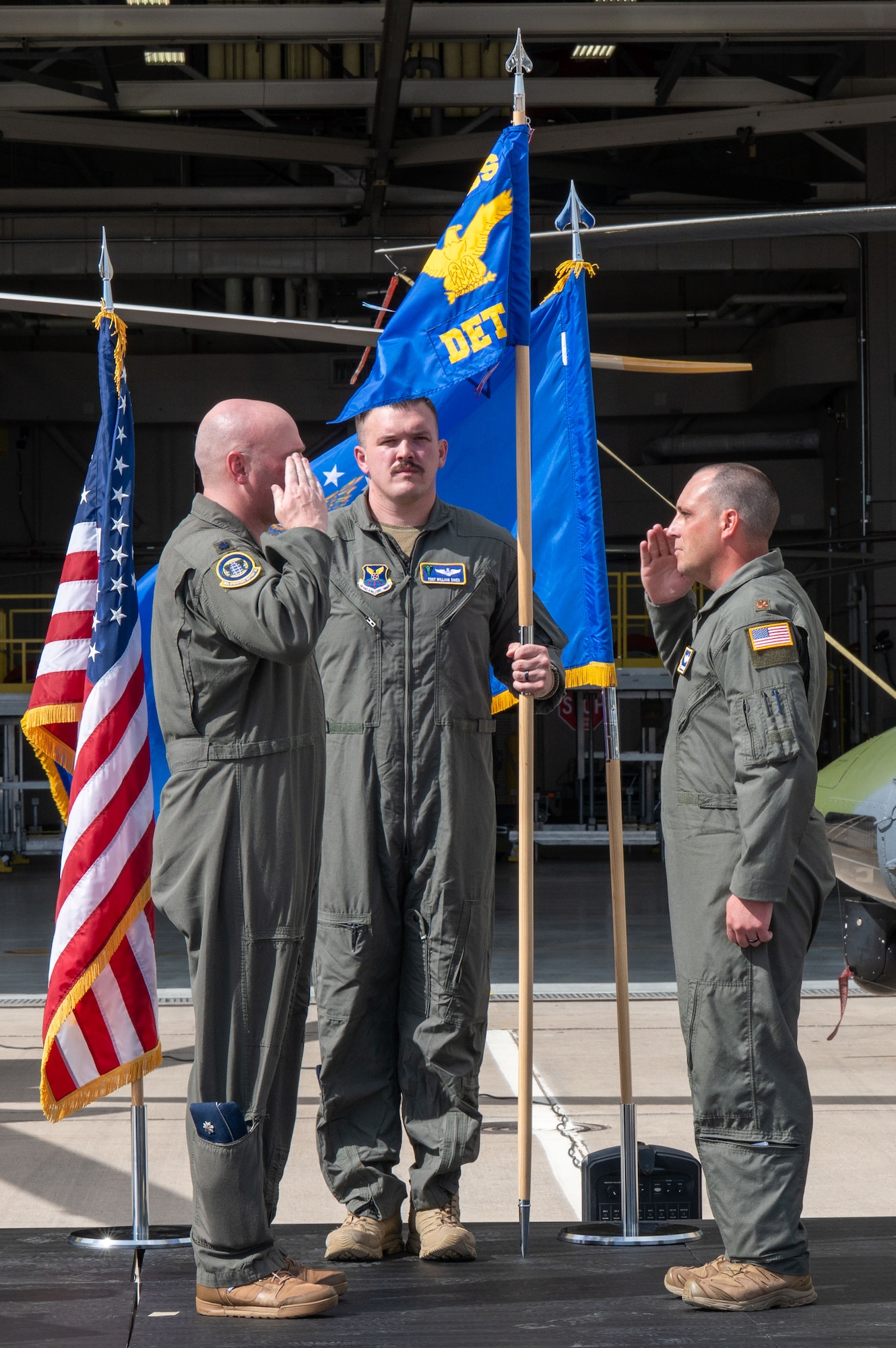U.S. Air Force Maj. Christopher Boise, right, accepts command of the 582nd Operations Support Squadron Detachment 4 from Lt. Col. Matthew Walker, 582 OSS commander, during a change of command ceremony at Malmstrom AFB, Mont.