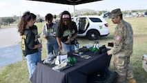 Students Speak to Army Recruiter at the U.S. Army Experience