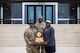From left, Lt. Gen. Kevin D. Admiral, Commanding General of the III Armored Corps and Fort Hood, Sgt. 1st Class Leroy Betts, and Claude Mathis, head football coach of DeSoto High School pose on the steps of the III Armored Corps headquarters at Fort Hood, Texas.