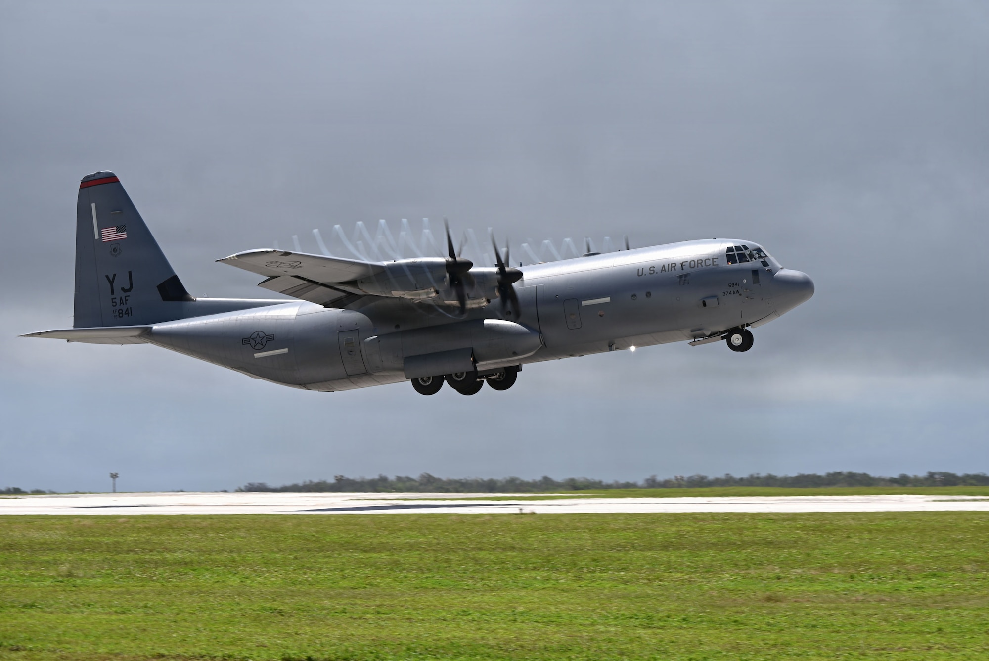 A C-130J Super Hercules assigned to the 374th Airlift Wing takes off to support disaster relief efforts in the wake of Typhoon Sinlaku at Andersen Air Force Base, Guam, April 23, 2026. Government and military organizations will continue to adapt and provide support where it is most needed to help communities recover as quickly as possible. (U.S. Air Force photo by Senior Airman Audree Campbell)