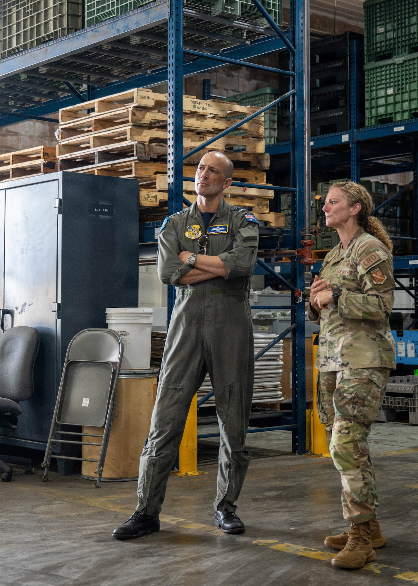 U.S. Air Force Lt. Col. Megan Moriarity, 647th Logistics Readiness Squadron commander, briefs Royal Australian Air Force Air Vice-Marshal David Titheridge, Pacific Air Forces deputy commander, at Joint Base Pearl Harbor-Hickam, May 19, 2026. Moriarity highlighted the value of advancing the 15th Wing’s logistics infrastructure to support mission readiness and future operational requirements. (U.S. Air Force photo by Senior Airman Lauren Torres)