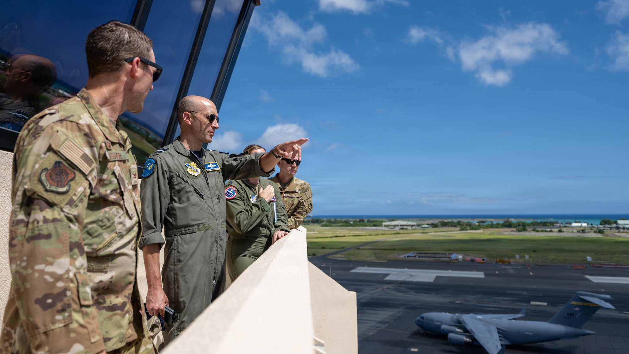 Royal Australian Air Force Air Vice-Marshal David Titheridge, Pacific Air Forces deputy commander, receives a tour of the flight line at Joint Base Pearl Harbor-Hickam, May 19, 2026. Titheridge discussed flight line modernization initiatives intended to reinforce the 15th Wing’s ability to generate and sustain combat airpower. (U.S. Air Force photo by Senior Airman Lauren Torres)