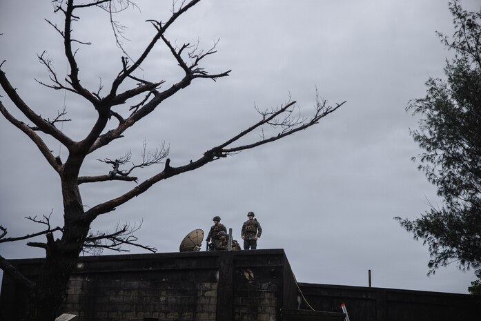 U.S. Marines with 7th Communication Battalion, III Marine Expeditionary Force Information Group, set up a Marine Corps wideband satellite-expeditionary system during Kaiju Rain 26 at Camp Hansen, Okinawa, Japan, May 9, 2026.