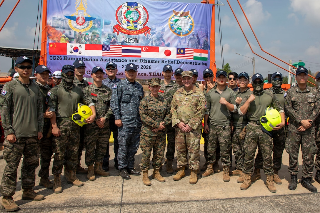 Maj. Gen. Valerie A. Jackson and Col. John Patrick pose with Republic of Korea military personnel during Exercise Cobra Gold 2026.