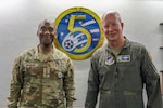 U.S. Army Gen. Xavier T. Brunson, commander of USFK, poses with Air Force Lt. Gen. Joel Carey, commander of 5th Air Force, to discuss operational planning at Yokota Air Base, Japan.