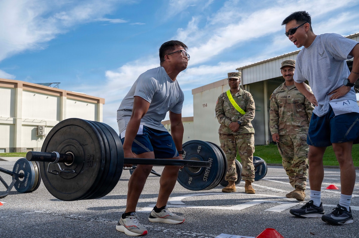 Staff Sgt. Louver Cara, 18th Logistics Readiness Squadron refueling maintenance supervisor, performs a deadlift during the Warrior Gauntlet at Kadena Air Base, Japan, May 8, 2026. The course combined 10 events inspired by physical fitness assessments from each military branch and was designed to test endurance, strength and overall readiness. (U.S. Air Force photo by Senior Airman Greydon Furstenau)