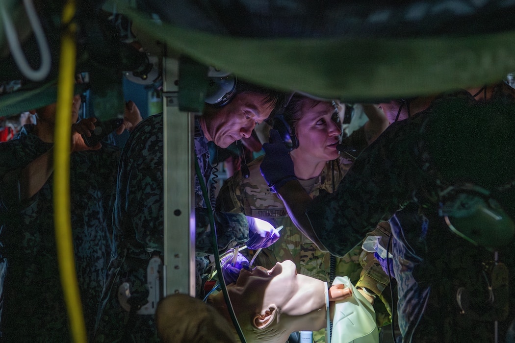 U.S. and Foreign service member train on patient care.