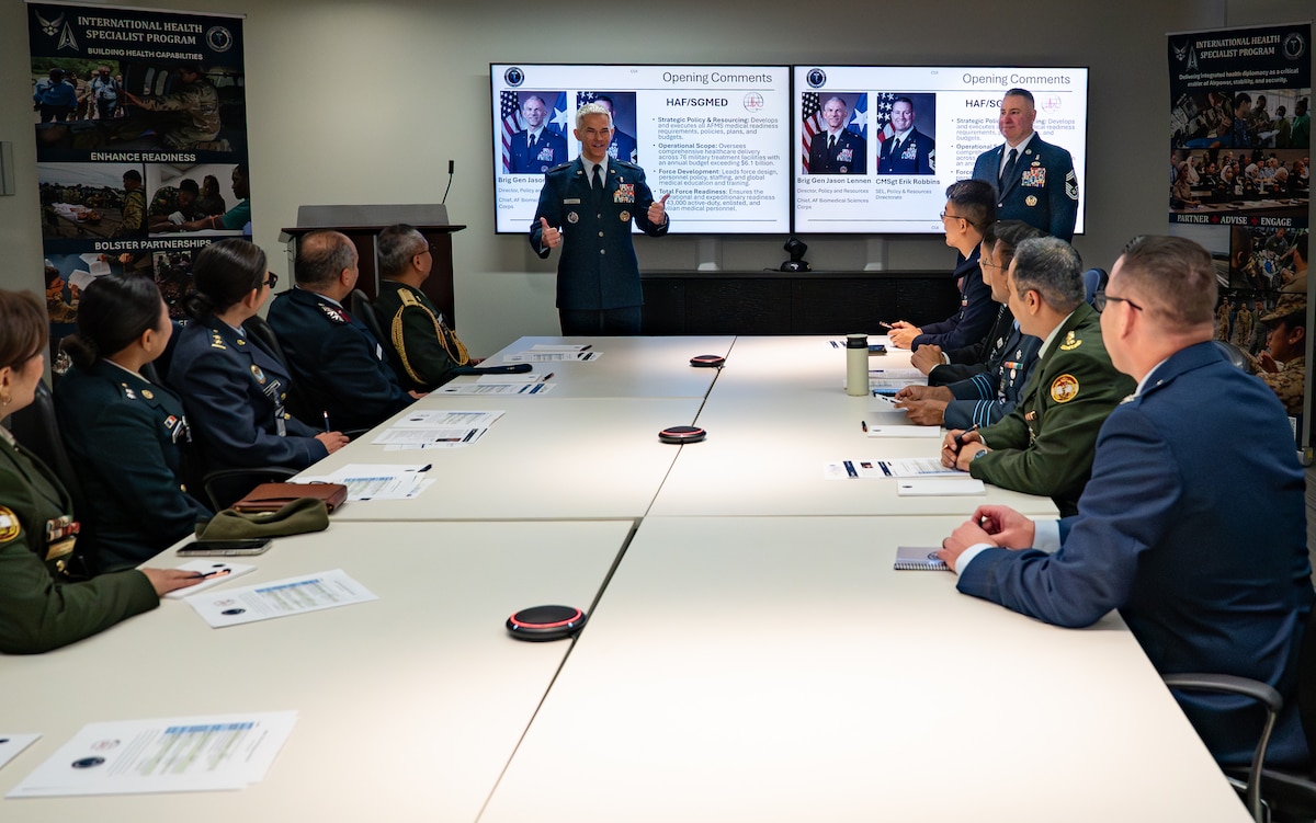 Image of Airmen speaking to a crowd.