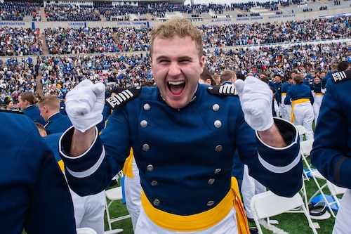 Graduates celebrate after the ceremony following the U.S. Air Force Academy Class of 2026 graduation at Falcon Stadium in Colorado Springs, Colo., May 28, 2026. A total of 931 cadets received commissions as second lieutenants in the U.S. Air Force and U.S. Space Force. (U.S. Air Force photo by Trevor Cokley)
