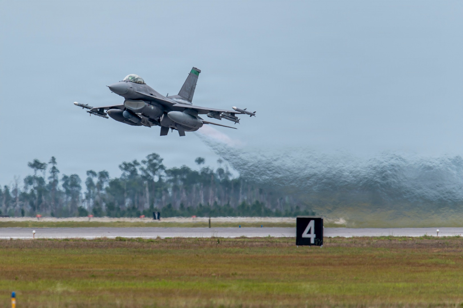 A U.S. Air Force F-16 Fighting Falcon assigned to the Ohio National Guard’s 180th Fighter Wing takes off for a training flight during Checkered Flag 26-2 and the Weapons System Evaluation Program-East at Tyndall Air Force Base, Fla., April 29, 2026.