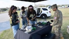 Students from high schools around Central Texas speak to a U.S. Army recruiter during the Career Expo at the U.S. Army Experience on March 26, 2026 at Fort Hood, Texas.