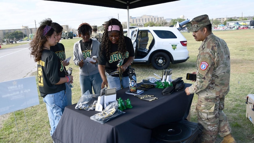 Students from high schools around Central Texas speak to a U.S. Army recruiter during the Career Expo at the U.S. Army Experience on March 26, 2026 at Fort Hood, Texas.