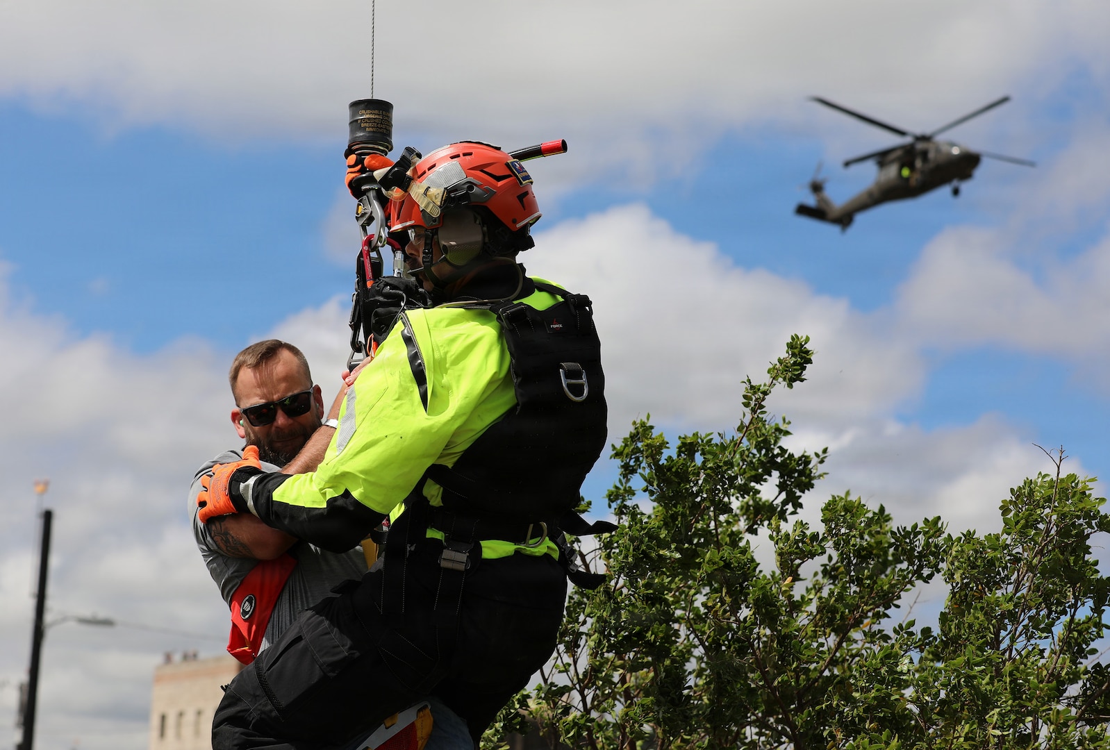 Stephen Winchell, a rescue swimmer from Task Force 1, rescues a role player during the 2026 Search and Rescue Exercise in the San Antonio area, May 18-21.