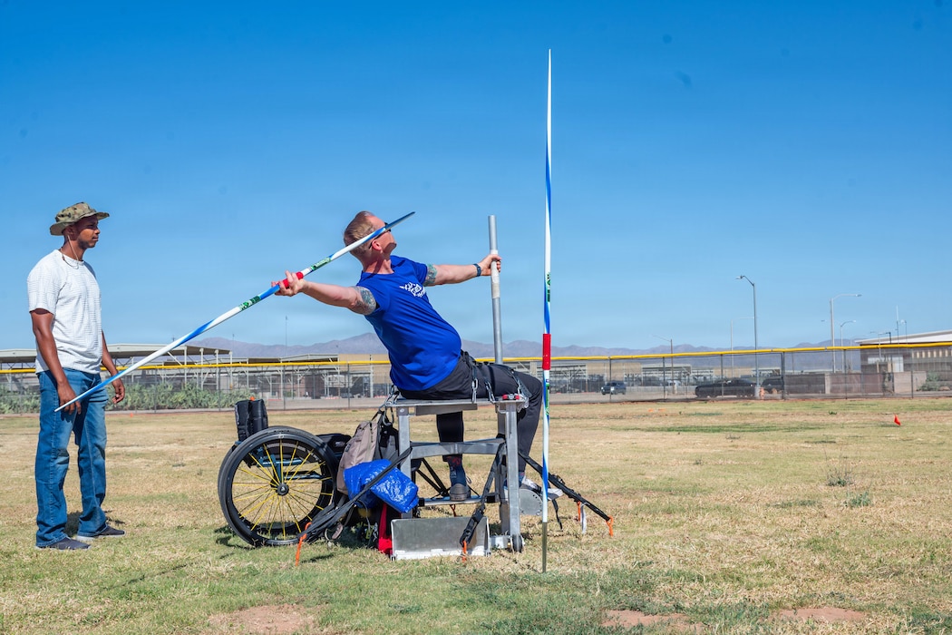 Julius McManus, a U.S. Navy veteran, throws a javelin during Paralympic training at Luke Air Force Base, Arizona, May 27, 2026. The training event featured competitive adaptive sports to aid in recovery and build confidence to strengthen a culture of resilience and support that mirrors Luke AFB’s commitment to people and mission. (U.S. Air Force photo by Airman 1st Class Tekorey Watkins)