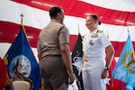 Military officers on stage