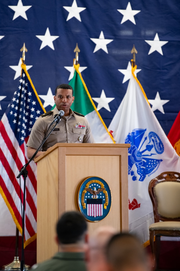 Army Officer speaking at a podium.