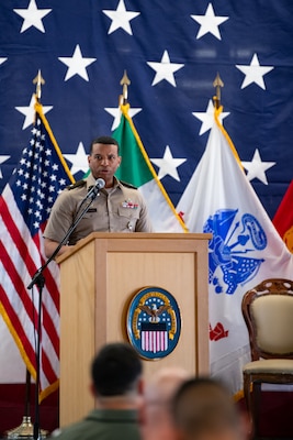 Army Officer speaking at a podium.