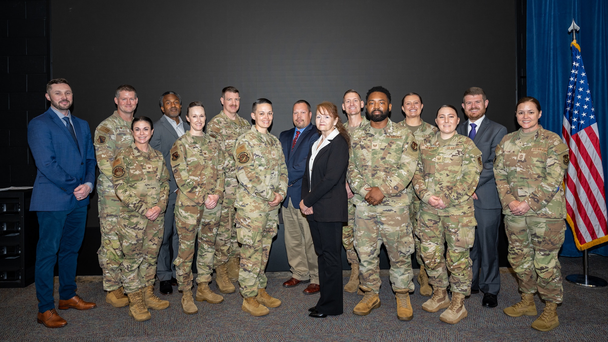 A group photo of military and civilian personnel