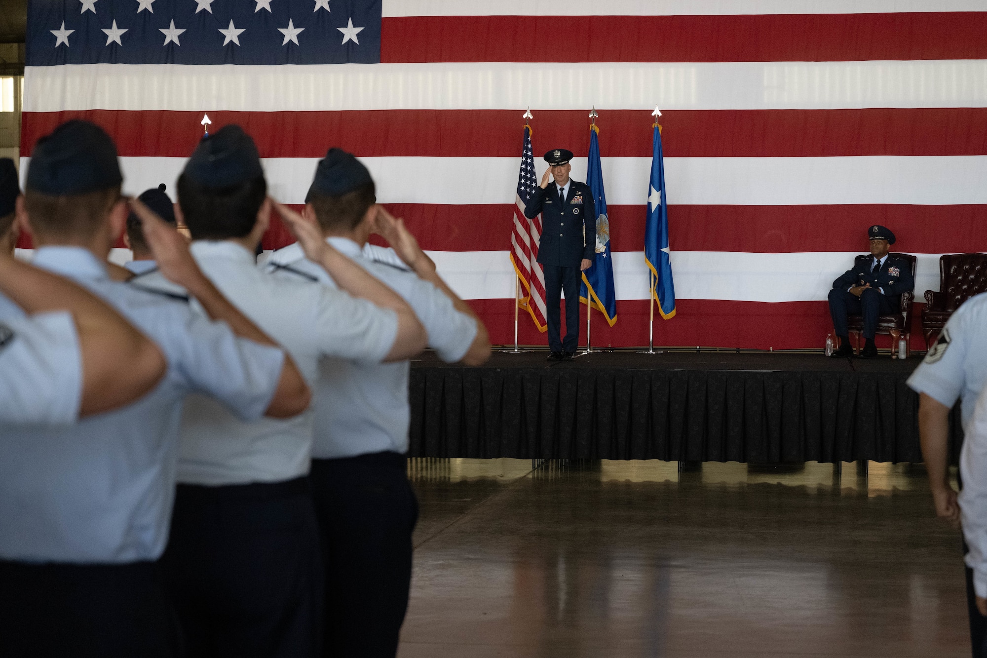 U.S. Air Force Col. Eric Bissonette, 47th Flying Training Wing (FTW) commander, gives his first salute as commander to his unit during the 47th FTW change of command ceremony at Laughlin Air Force Base, Texas, May 28, 2026. As commander, Bissonette will be responsible for 2,800 military and civilian personnel engaged in executing over 71,000 aircraft sorties annually in support of Laughlin’s Undergraduate Pilot Training mission. (U.S. Air Force photo by Airman 1st Class Darryl Keith)