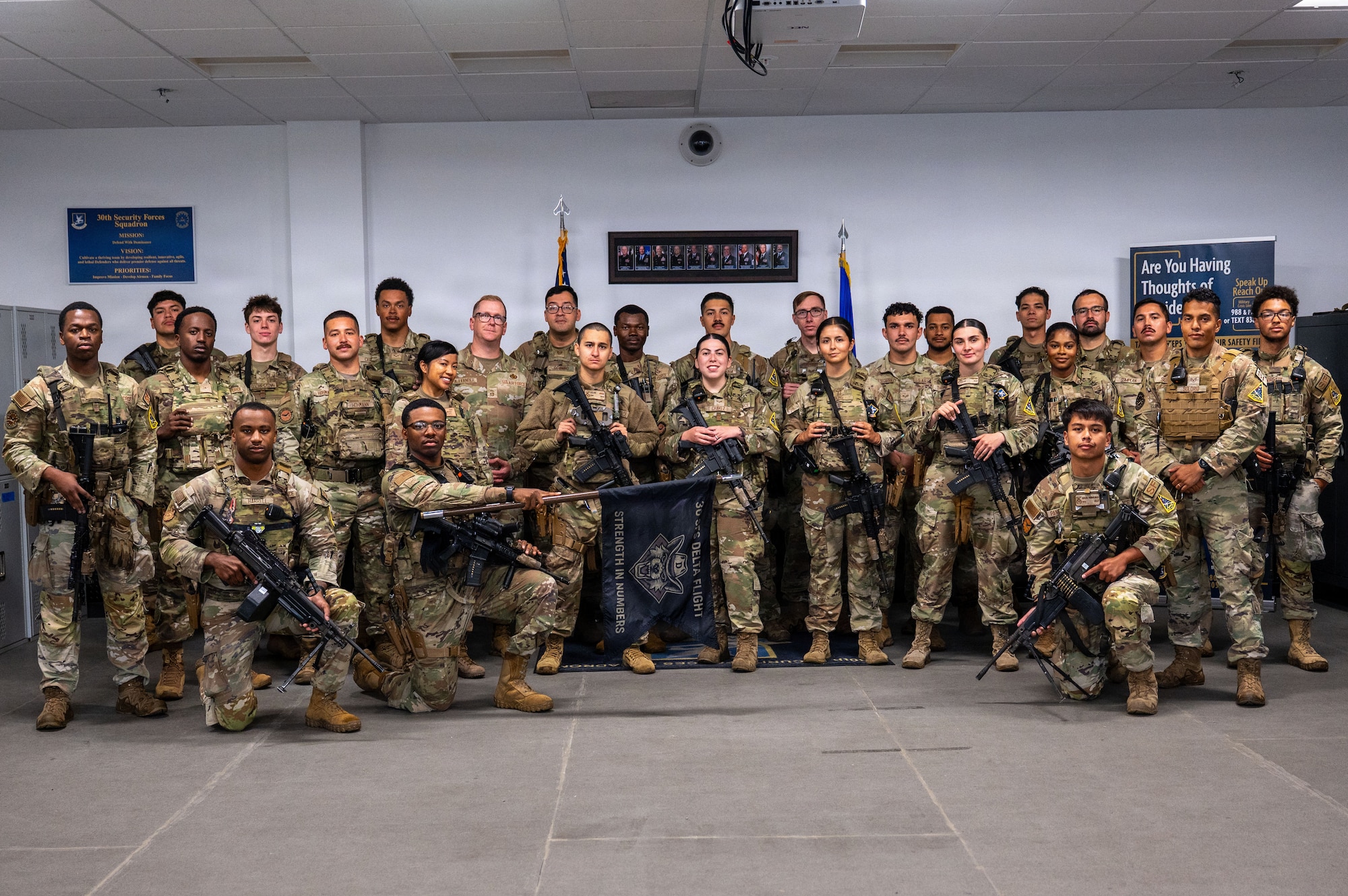 a group of military members stand in a group