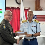 New Mexico National Guard at the signing ceremony were Joint Staff Director Brig. Gen. Pia Romero and State Command Sgt. Maj. Chris Poccia, whose presence underscored the Guard’s commitment to building a strong and enduring relationship with the Seychelles Defence Forces across all levels of leadership. Photo courtesy New Mexico National Guard.