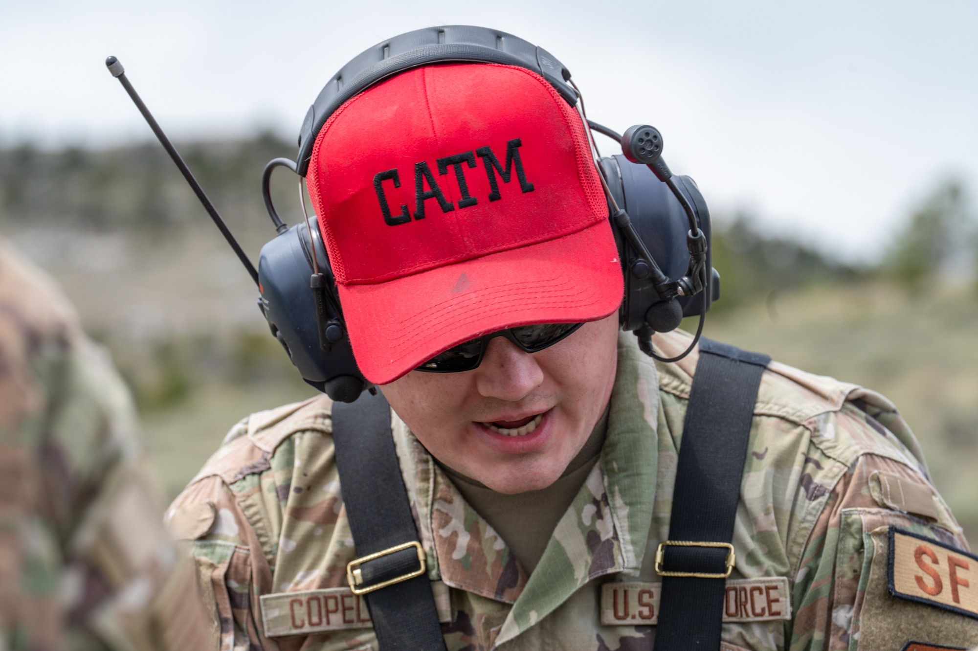 A close up of a uniformed man speaking.