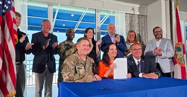 U.S. Army Corps of Engineers, Jacksonville District Commander Col. Brandon Bowman, with Assistant Secretary of the Army for Civil Works, Adam Telle and Deputy Commanding General for Civil and Emergency Operations, Maj. Gen. Jason Kelly conducts the signing of a Project Cooperation Agreement Amendment with Pinellas County, resolving longstanding implementation issues involving easement requirements and public access provisions that have created uncertainty surrounding future nourishment cycles.
