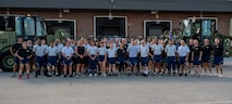 Airmen pose for a group photo.