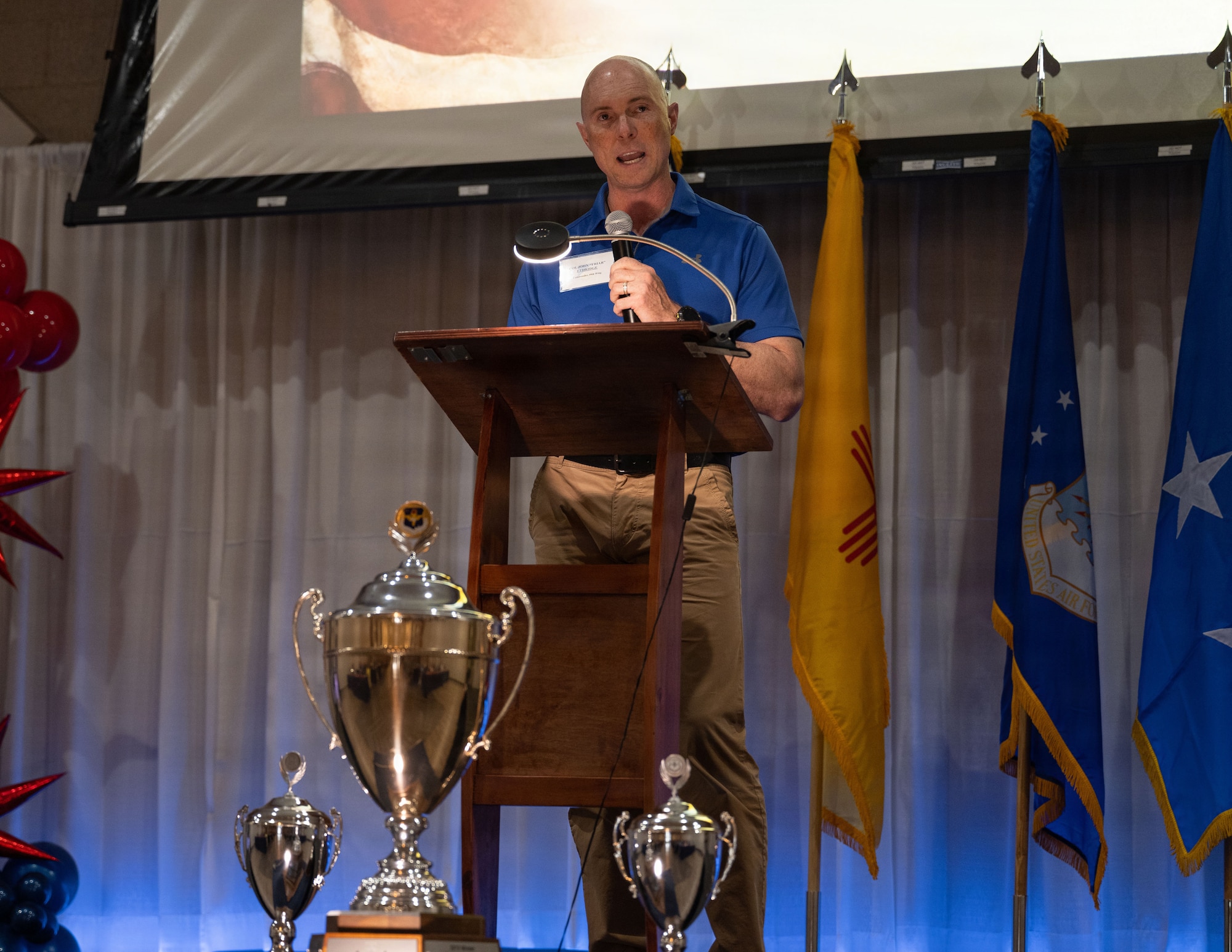 U.S. Air Force Col. John Ethridge, 49th Wing commander, speaks after accepting the Altus Trophy during the Altus Military Affairs Community Support Award (Altus Trophy) ceremony.