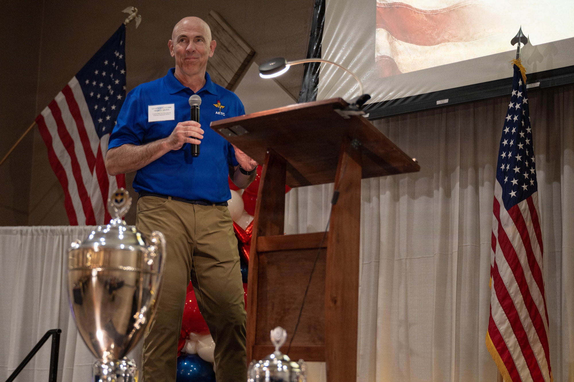 U.S. Air Force Lt. Gen. Clark Quinn, commander of Air Education and Training Command, speaks to attendees during the Altus Military Affairs Community Support Award (Altus Trophy) ceremony.