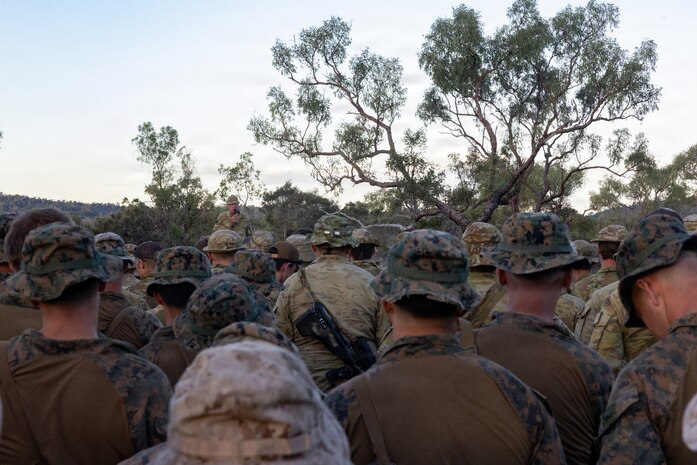 U.S. Marines with Alpha Company, 1st Battalion, 5th Marine Regiment, Marine Rotational Force – Darwin 26, receive a brief about exercise Southern Jackaroo at Townsville Field Training Area, Australia, May 27, 2026.