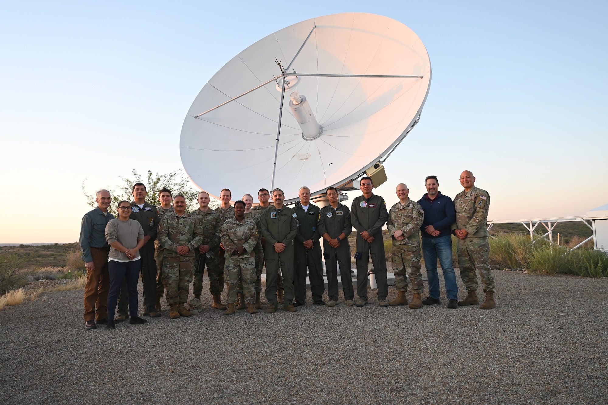 U.S. Guardians assigned to Space Forces Southern and Foreign Liaison Officers pose for a group photo during a space immersion tour at the Space4 Center in Oracle, Arizona, May 27, 2026. This tour showcased space capabilities to critical military representatives from partner nations, to enhance interoperability opportunities and strengthen partnerships for combined space operations throughout the U.S. Southern Command area of responsibility. (U.S. Air Force photo by Staff Sgt. Abbey Rieves)
