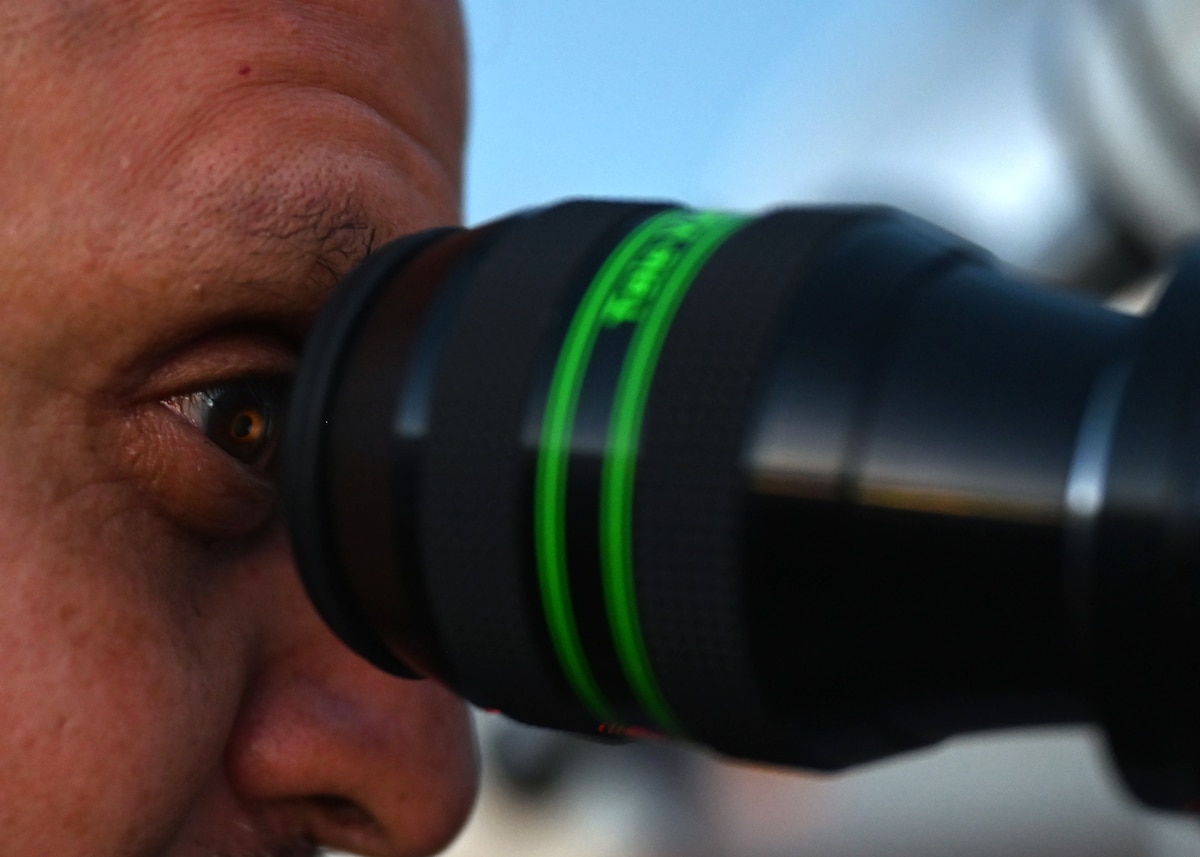U.S. Space Force Lt. Col. Daniel Morales, Space Force Southern chief of plans, looks through telescope during a space immersion tour at the Space4 Center in Oracle, Arizona, May 27, 2026. The telescope is used for tracking satellites and monitoring space debris. (U.S. Air Force photo by Staff Sgt. Abbey Rieves)