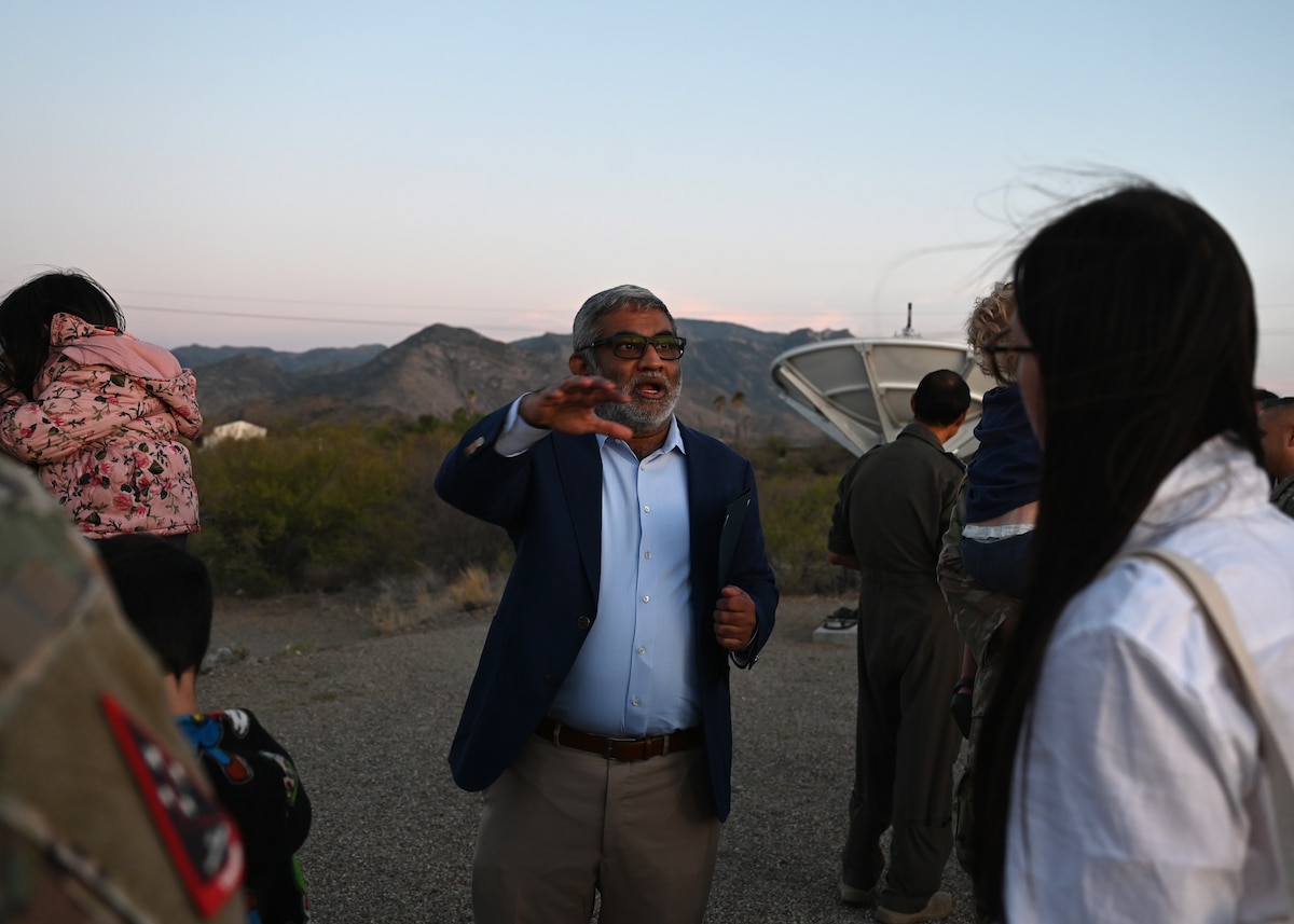 Professor Vishnu Reddy, Space4 Center director, speaks with Space Forces Southern Guardians, Foreign Liaison Officers and family members during a Space Domain Awareness Observatory complex tour in Oracle, Arizona, May 27, 2026. Participants visited the center for an immersive space domain awareness experience. (U.S. Air Force photo by Staff Sgt. Abbey Rieves)