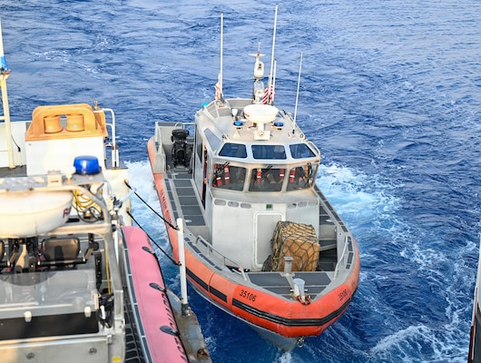 A U.S. Coast Guard 35-foot Long-Range Interceptor embarked cutter boat departs Legend-class cutter USCGC Midgett (WMSL 757) with members of the Philippine Navy after training with Midgett’s crew during the Maritime Cooperative Activity (MCA) in the Philippines’ Exclusive Economic Zone, May 28, 2026. The U.S Navy routinely operates with the Armed Forces of the Philippines and partners and allies through MCAs to continually develop, exercise and enhance multi-domain tactical interoperability to uphold peace and security in the region. Midgett is forward-deployed and assigned to Destroyer Squadron (DESRON) 15, the Navy’s largest DESRON and U.S. 7th Fleet’s principal surface force. U.S. 7th Fleet, the Navy’s largest forward-deployed numbered fleet, routinely interacts and operates with allies and partners in preserving a free and open Indo-Pacific.  (U.S. Coast Guard Photo by Petty Officer 3rd Class Austin Wiley)