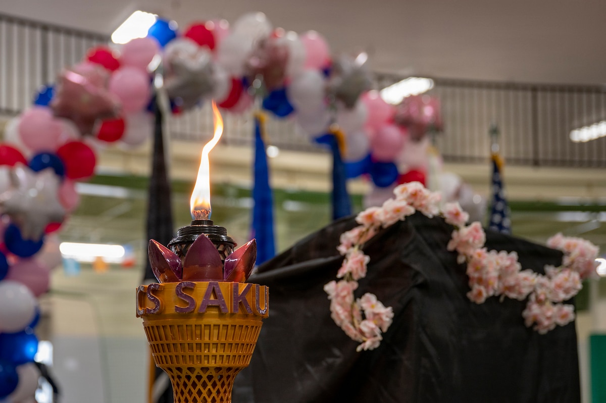 A Sakura Olympics torch burns during the Sakura Olympics 2026 closing ceremony at Misawa Air Base, Japan, May 29, 2026. Through sports and friendly competition, participants built lasting connections and reinforced the partnership between U.S. and Japanese personnel. (U.S. Air Force photo by Senior Airman Brittany Russell)