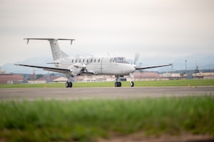 An Aircraft land in a landing zone.