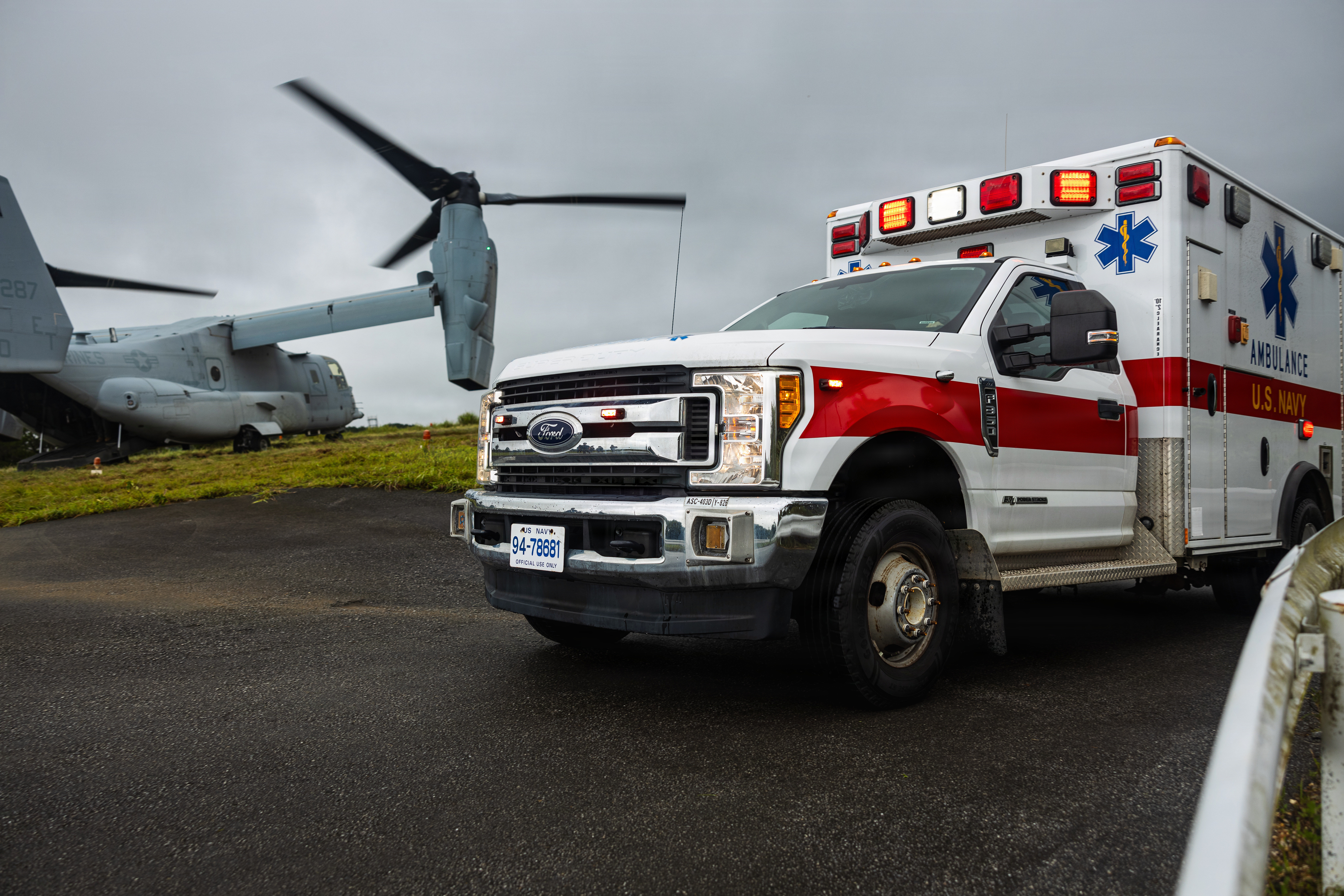An ambulance arrives to conduct a simulated casualty evacuation at Jungle Warfare Training Center, Camp Gonsalves, Okinawa, Japan, Aug. 12, 2026. The training represents a validation of 3rd Marine Division’s processes and procedures for casualty evacuation, signifying proficiency for rendering aid to personnel in a timely manner. (U.S. Marine Corps photo by Sgt. Adam Trump)