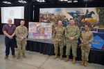 (L to R) Daniel O’Leary, 11th Battalion executive director, Army Maj. Brian Erwin, Little Rock MEPS commander, Brig. Gen. Olen Bridges, adjutant general of the Arkansas National Guard, Navy Capt. Chris Carmichael, former USMEPCOM Western Sector commander, and Lt. Col. Elizabeth Cantrell, USMEPCOM 11th Battalion commander, pose for a photo at the National Guard Association of the United States General Conference, Aug. 29. USMEPCOM discussed how integrating National Guard personnel into MEPS operations is improving applicant processing and supporting recruiting success at the 148th NGAUS General Conference.