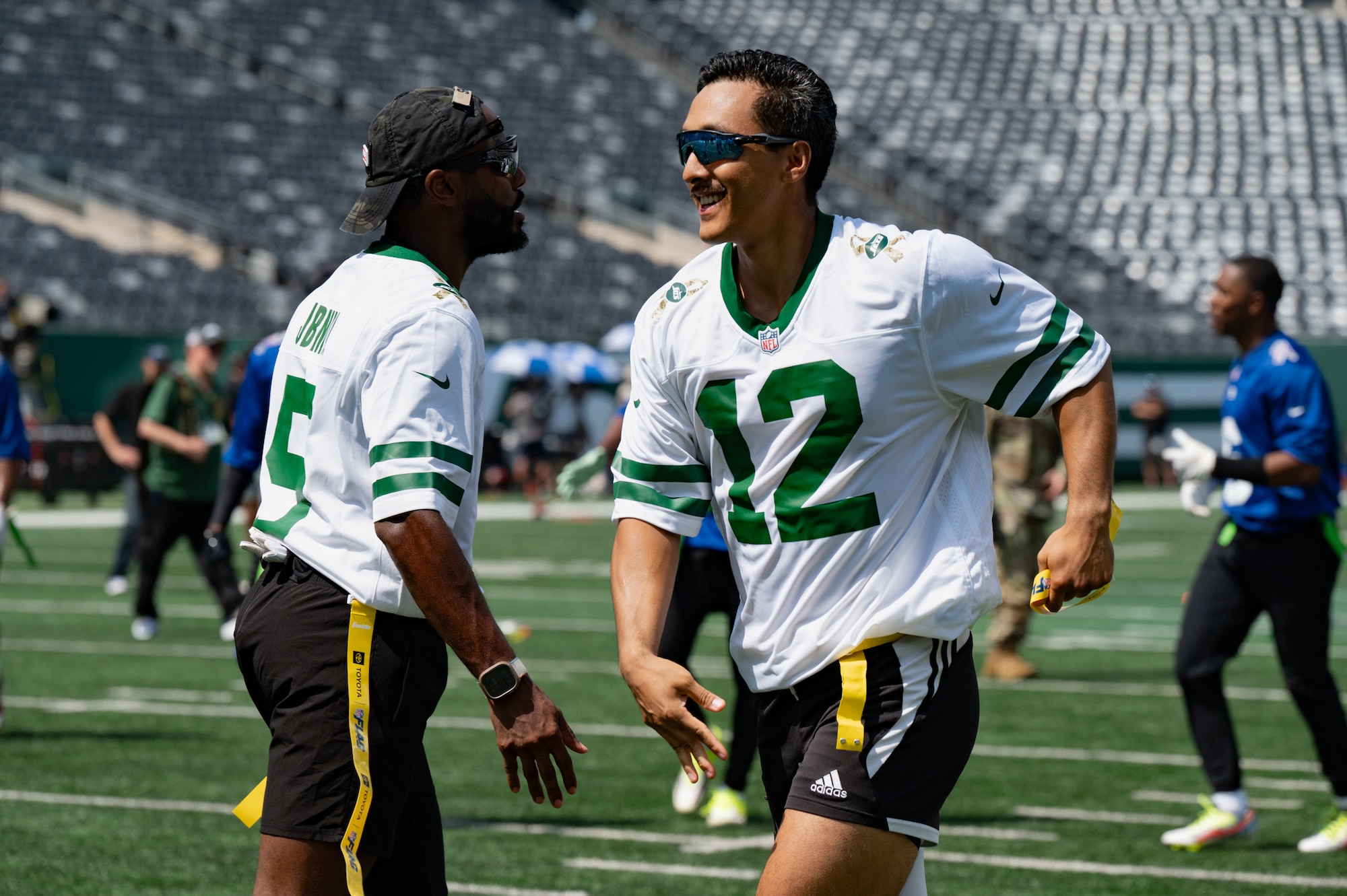 Service members assigned to Joint Base McGuire-Dix-Lakehurst congratulate each other during the 2026 Salute to Service Bowl at MetLife Stadium, N.J., Aug. 28, 2026. The annual flag football game boosts morale, encourages teamwork and allows service members to participate in friendly competition. (U.S. Air Force photo by Airman 1st Class Haeleigh Bayle)