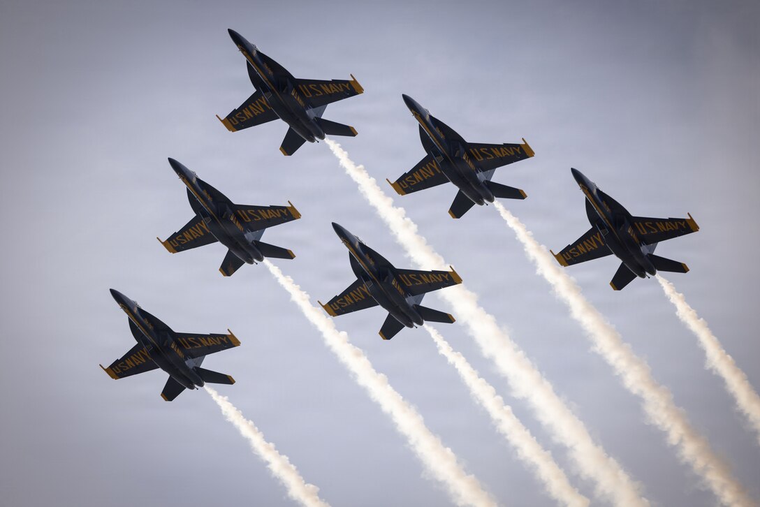 U.S. Navy F/A-18 Super Hornet aircraft with flight demonstration squadron, the Blue Angels, perform a fly-over at Marine Corps Support Facility New Orleans, Aug. 30, 2026. The Blue Angels performed this fly-over in celebration of 110th anniversary of the Marine Corps Reserve. (U.S. Marine Corps photo by Sgt. Emily De La Torre)